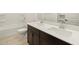 Shared bathroom with a double vanity and a bathtub at 36833 W La Paz St, Maricopa, AZ 85138