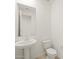 Clean powder room with pedestal sink and toilet at 36833 W La Paz St, Maricopa, AZ 85138