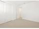 Spacious bedroom with double door closet and access to another room at 36833 W La Paz St, Maricopa, AZ 85138