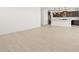 Spacious living room with kitchen and dining area views at 36833 W La Paz St, Maricopa, AZ 85138
