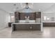 Gorgeous kitchen with a large central island, modern appliances, and ample cabinet space at 19964 W Marshall Ave, Litchfield Park, AZ 85340