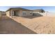 Large backyard with gravel and block wall at 37422 W San Clemente St, Maricopa, AZ 85138
