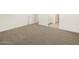 Spacious bedroom with carpeting and access to bathroom at 37422 W San Clemente St, Maricopa, AZ 85138