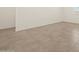 Spacious bedroom with neutral carpeting and large closet at 37422 W San Clemente St, Maricopa, AZ 85138
