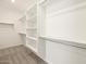 Large walk-in closet with ample shelving and hanging space at 37422 W San Clemente St, Maricopa, AZ 85138