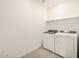 Laundry room with washer and dryer included at 37422 W San Clemente St, Maricopa, AZ 85138