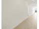 Bright hallway with light walls and tile flooring at 37501 W San Clemente St, Maricopa, AZ 85138