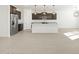 Modern kitchen with stainless steel appliances and an island at 37501 W San Clemente St, Maricopa, AZ 85138