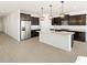Modern kitchen with stainless steel appliances and an island at 37501 W San Clemente St, Maricopa, AZ 85138