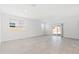 Bright and airy living room with sliding door to the patio at 40095 W Venture Rd, Maricopa, AZ 85138