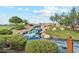 Landscaped waterfall feature with lush greenery at 40095 W Venture Rd, Maricopa, AZ 85138