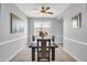 Dining room with wood table and seating for four at 12368 W Running Deer Trl, Peoria, AZ 85383