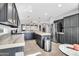 Spacious kitchen with stainless steel appliances and an island at 12368 W Running Deer Trl, Peoria, AZ 85383