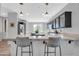 Kitchen island with seating, perfect for casual dining at 12368 W Running Deer Trl, Peoria, AZ 85383