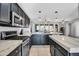 Modern kitchen with stainless steel appliances and island at 12368 W Running Deer Trl, Peoria, AZ 85383