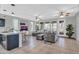 Spacious living room, open to kitchen and dining areas at 12368 W Running Deer Trl, Peoria, AZ 85383