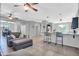 Open and airy living space with kitchen and dining area at 12368 W Running Deer Trl, Peoria, AZ 85383