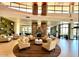 Elegant lobby with comfortable seating and fireplace at 12368 W Running Deer Trl, Peoria, AZ 85383