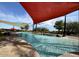 Resort style pool with large shade structures and lounge chairs at 12368 W Running Deer Trl, Peoria, AZ 85383