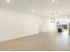 Bright and airy living room with tile floors, contemporary lighting fixtures, and an open concept design at 4255 W Jeanette Ln, San Tan Valley, AZ 85144