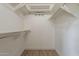 Walk-in closet with ample shelf and rod storage, perfect for organizing clothes and accessories at 4622 E Flower Ave, Mesa, AZ 85206