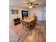 A view of a well-appointed dining area with a wood table and seating for six at 2661 N Higley Rd, Mesa, AZ 85215