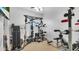 Fully equipped home gym with various weight training machines at 4276 E Meadowview Dr, Gilbert, AZ 85298