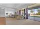 Spacious living room with large windows and backyard access at 4276 E Meadowview Dr, Gilbert, AZ 85298
