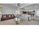 Open concept living room with kitchen views and recessed lighting at 4276 E Meadowview Dr, Gilbert, AZ 85298