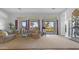 Spacious living room with large windows and backyard access at 4276 E Meadowview Dr, Gilbert, AZ 85298