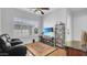 Relaxing media room with a large TV, comfortable seating, and extensive media library at 4276 E Meadowview Dr, Gilbert, AZ 85298