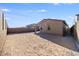 Unlandscaped backyard with ample space at 20254 W Roma Ave, Litchfield Park, AZ 85340