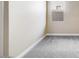 Well-lit bedroom featuring soft gray carpeting, neutral walls, and a window to allow for natural light at 20254 W Roma Ave, Litchfield Park, AZ 85340