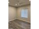 A Bedroom with neutral colored paint, ceiling fan, and new blinds at 2142 E Donner Dr, Tempe, AZ 85282