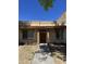 Charming single-story home with a well-maintained front yard, flower boxes, and a pathway leading to the front door at 2142 E Donner Dr, Tempe, AZ 85282