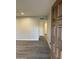 A view inside the front door, showcasing the gray-tone floor and neutral wall paint at 2142 E Donner Dr, Tempe, AZ 85282