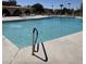 Sparkling community pool with clear blue water, surrounded by lounge chairs for relaxing and enjoying the sun at 2142 E Donner Dr, Tempe, AZ 85282