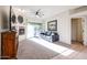 Living room with fireplace, sliding glass door and dark couch at 10401 N Saguaro Blvd # 132, Fountain Hills, AZ 85268