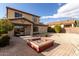 Spacious backyard with fire pit and patio area at 1245 N Compton Cir, Mesa, AZ 85207