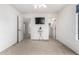 Spacious bedroom with carpet, a walk-in closet and access to another room at 1245 N Compton Cir, Mesa, AZ 85207