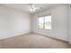 Bedroom with ceiling fan and window at 1245 N Compton Cir, Mesa, AZ 85207
