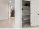 Well-lit pantry with ample shelving for storage at 1245 N Compton Cir, Mesa, AZ 85207