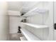 White shelving unit offering plenty of storage space at 1245 N Compton Cir, Mesa, AZ 85207