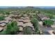 Bird's eye view of the house in a desert community surrounded by trees at 35202 N 30Th Dr, Phoenix, AZ 85086