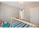 Bright bedroom with a stylish bed frame and a cozy, inviting atmosphere, perfect for rest and relaxation at 35202 N 30Th Dr, Phoenix, AZ 85086