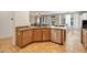 Kitchen featuring wooden cabinets, granite counters, stainless dishwasher, and an undermount stainless steel sink at 35202 N 30Th Dr, Phoenix, AZ 85086