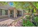 Charming landscaped backyard with patio, pergola, and garden provides a beautiful, inviting outdoor space at 35202 N 30Th Dr, Phoenix, AZ 85086