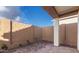 Picture of the backyard with retaining wall at 4430 N 203Rd Dr, Buckeye, AZ 85396