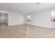 Spacious living room featuring tile flooring, recessed lighting and multiple windows providing lots of natural light at 5323 W Manzanita Dr, Glendale, AZ 85302