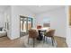 Cozy dining area with sliding glass doors to patio and round table at 16625 N Lunar St, Maricopa, AZ 85138